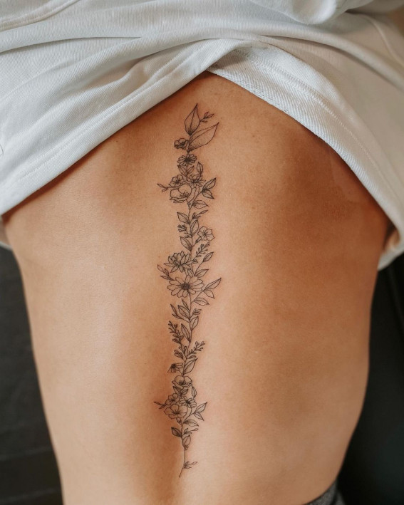 75 Unique Small Tattoo Designs & Ideas : Prettiest Birth Flower Spine Piece