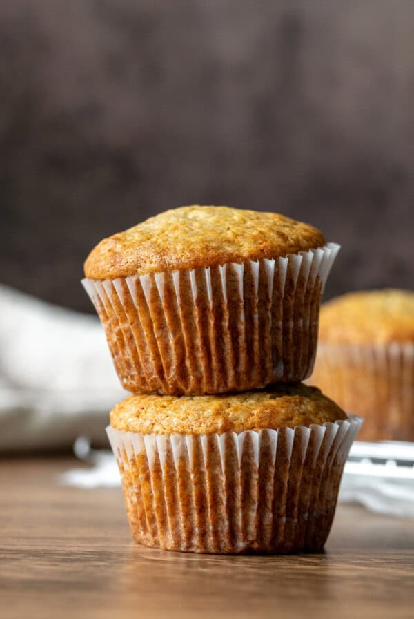 Two banana bread muffins, stacked on top of each other