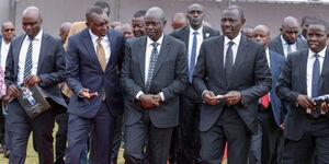 President William Ruto, Deputy President Rigathi Gachagua and Kapseret MP Oscar Sudi during the burial of the late Kelvin Kiptum on Friday, February 23, 2024. 