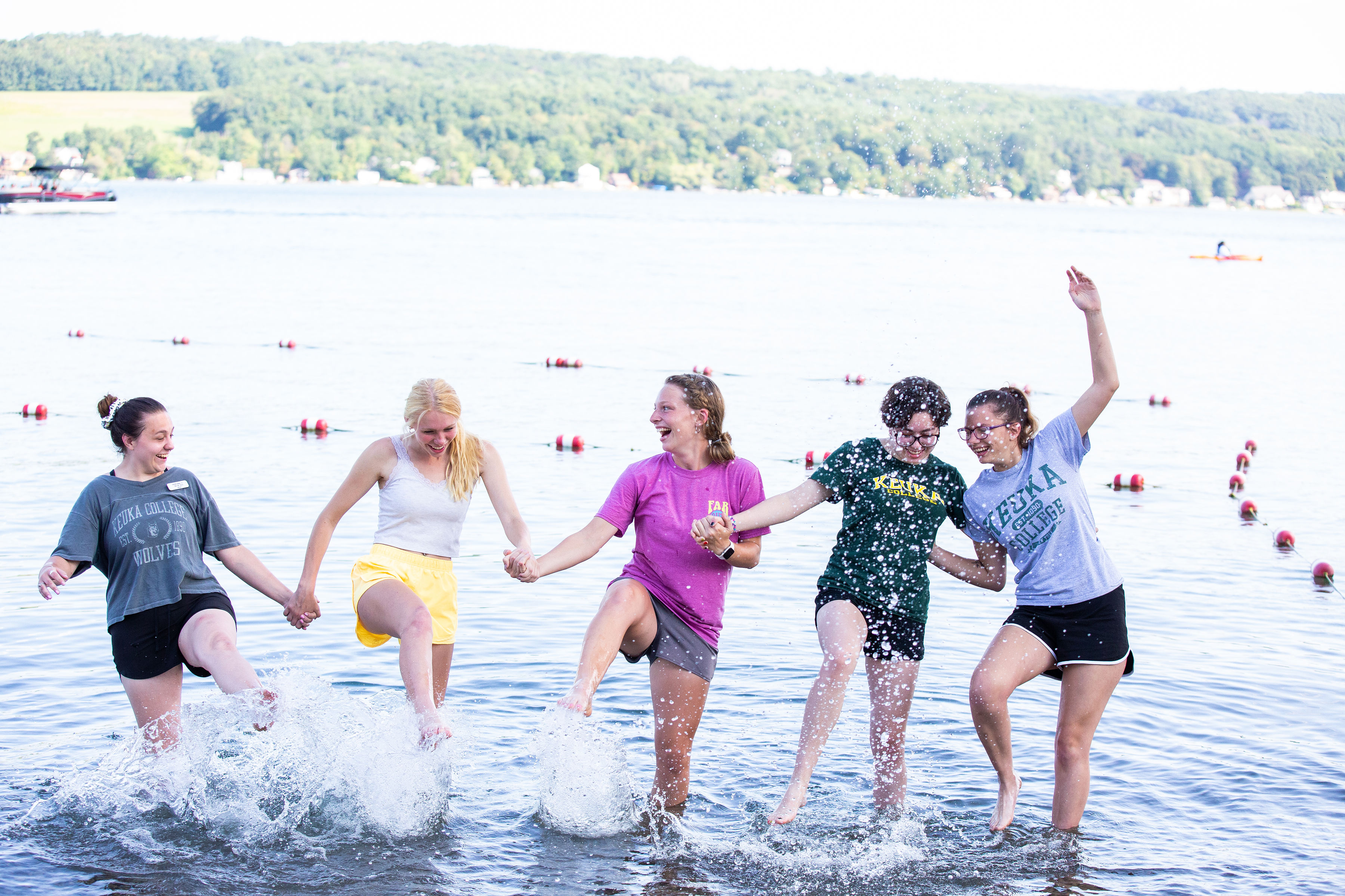 Students at Point Neamo playing in the lake 