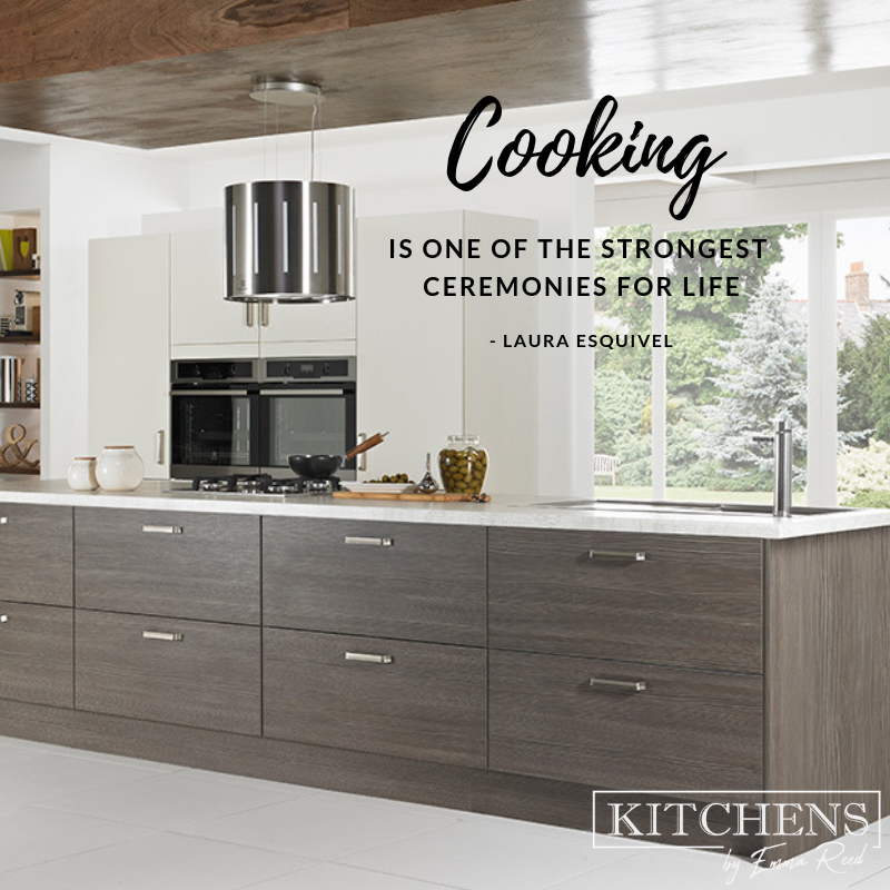 A kitchen with dark wood cabinets