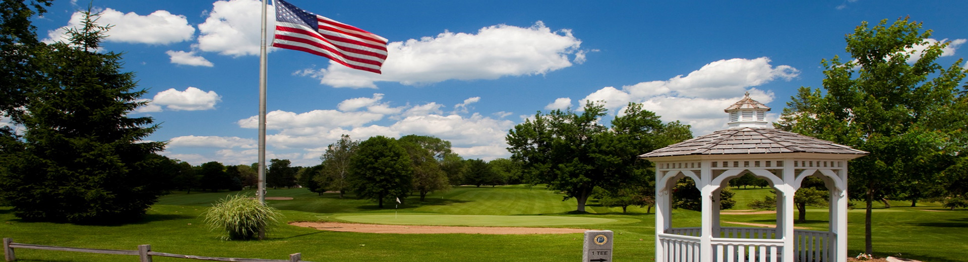 golf course with gazebo and flag