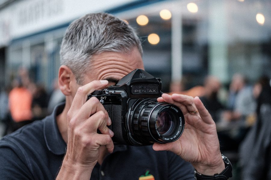 My friend holding the giant Pentax 6x7 + 105mm f2.4 lens