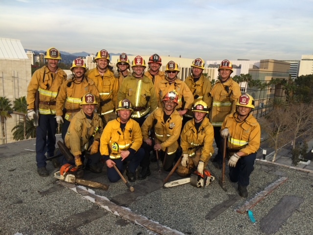 Subject with crew on roof after doing training