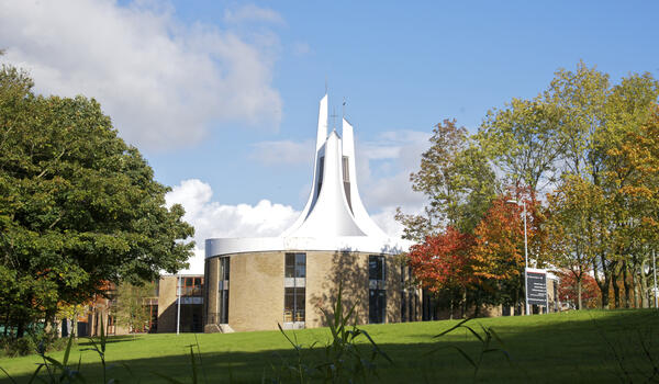 A photo of the Chaplaincy Centre surrounded by trees