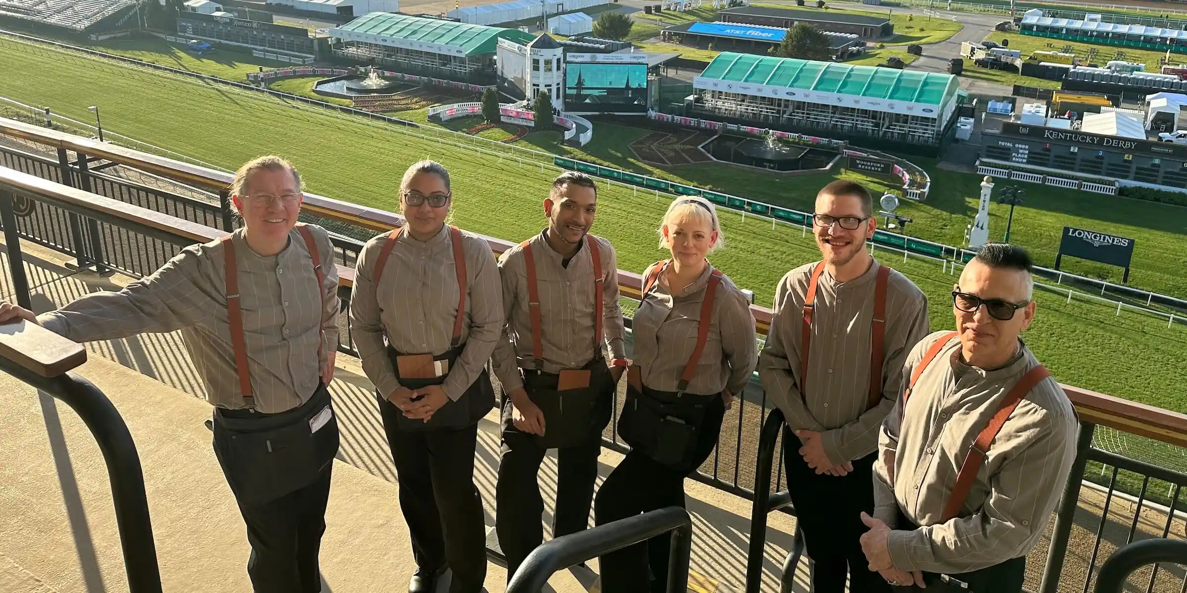 group of team members at the kentucky derby - Desktop Version