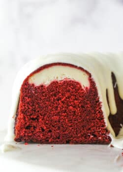 The end of a red velvet cheesecake swirl bundt cake