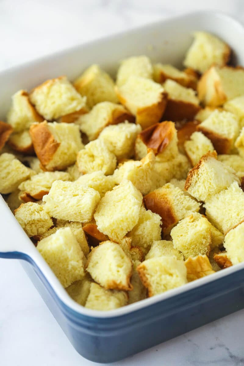 Bread cubes in a baking dish.