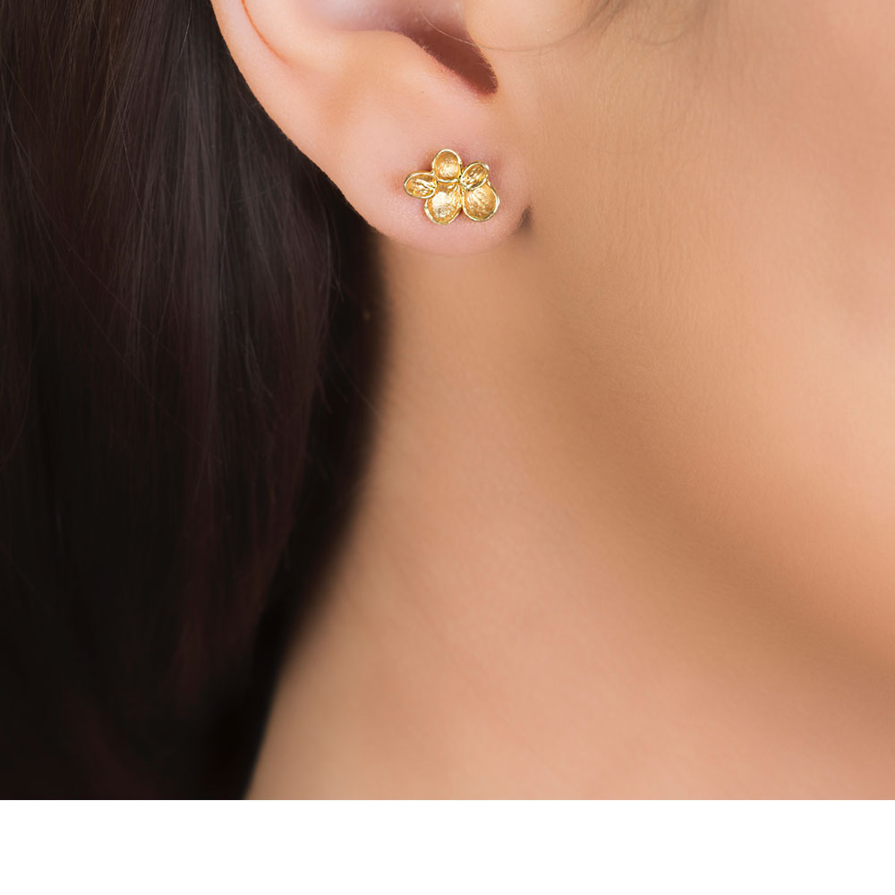 Yellow gold falling leaves stud earrings