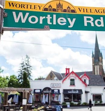 A view of the Wortley Road street sign with the Sweet Onion Bistro in Old South/Wortley Village in London, Ontario.