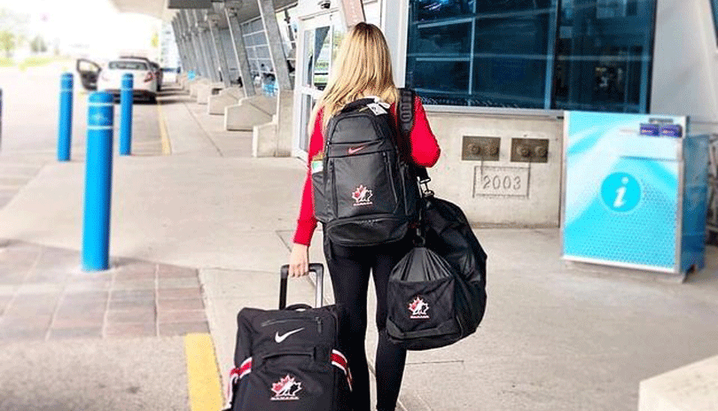 Women walking into YXU airport.