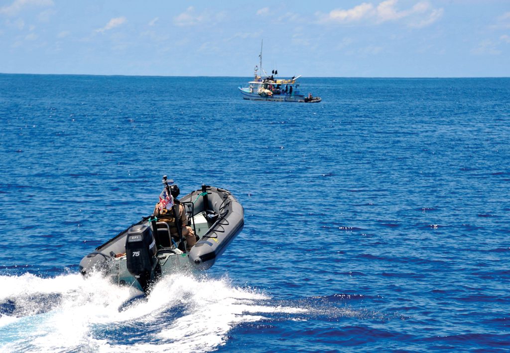 HMCS Saskatoon and the U.S. Coast Guard Southeast Law Enforcement Detachment prepare to intercept a target of interest on March 14.