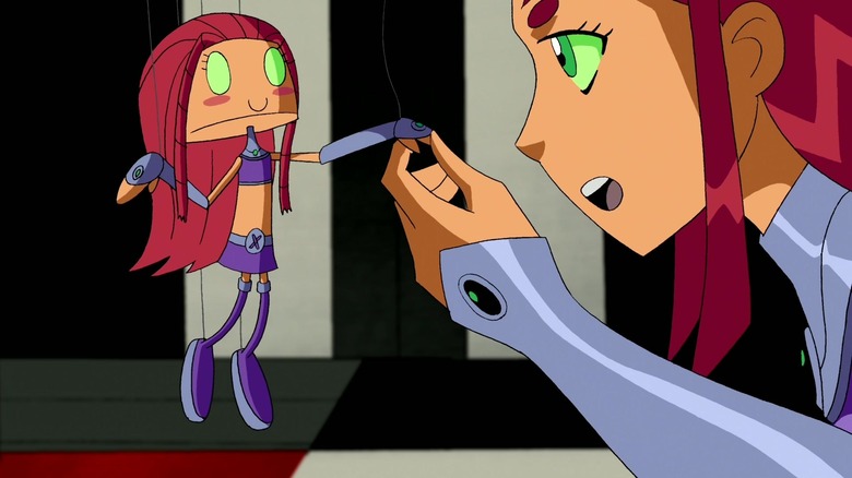 Starfire playing with puppet