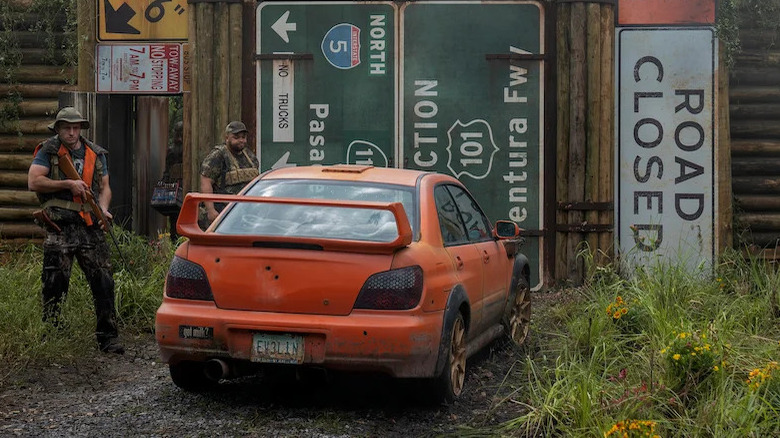 John Doe's car outside outpost