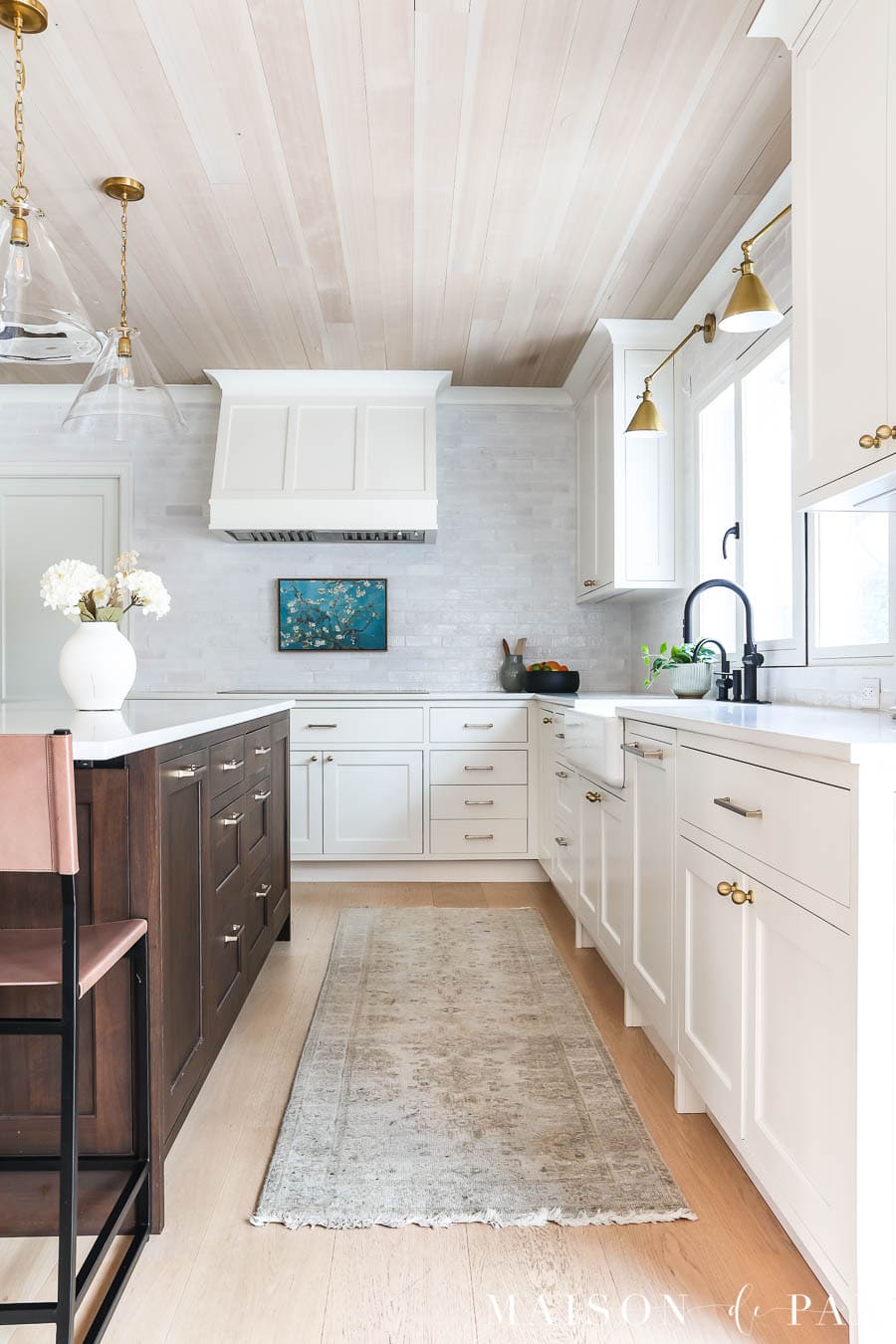 Warm White Kitchen with Wood Island