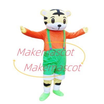 Young Tiger With Green Shorts Mascot Costume