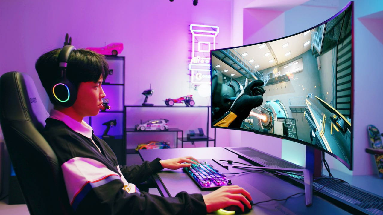 Boy playing game on a PC