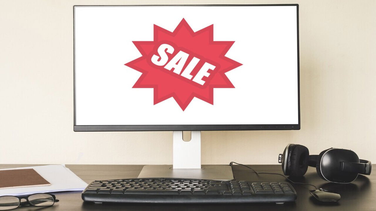 desktop PC screen with sale tag in the middle