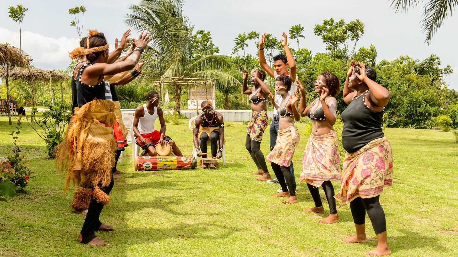 Gabonese people doing traditional danxe