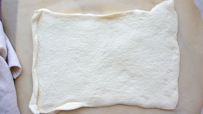 a rectangle of dough on parchment paper