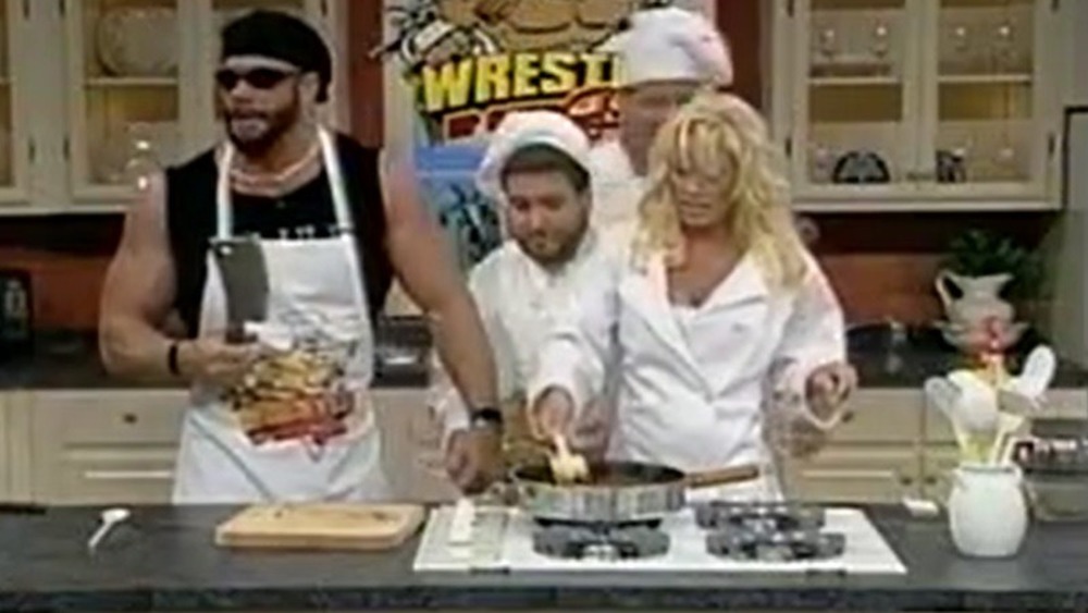 Randy Savage holding cleaver on cooking show