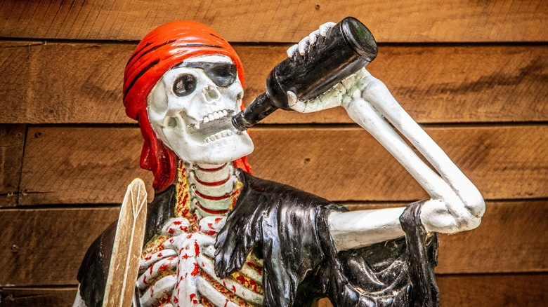 Skeleton pirate drinking a beer