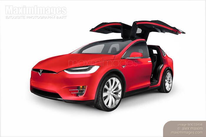 Red Tesla Model X luxury SUV electric car with open falcon-wing doors Stock Image MXI33494 © Alex Maxim / MaximImages