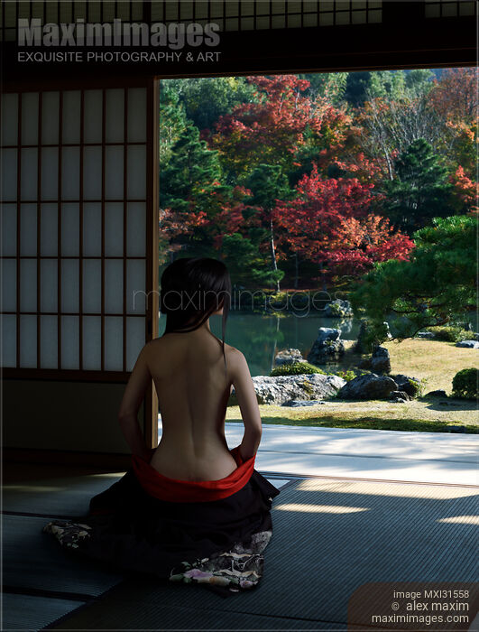 Sensual asian woman with naked back sitting in a Japanese house with autumn scenery garden view Stock Image MXI31558 © Alex Maxim / MaximImages