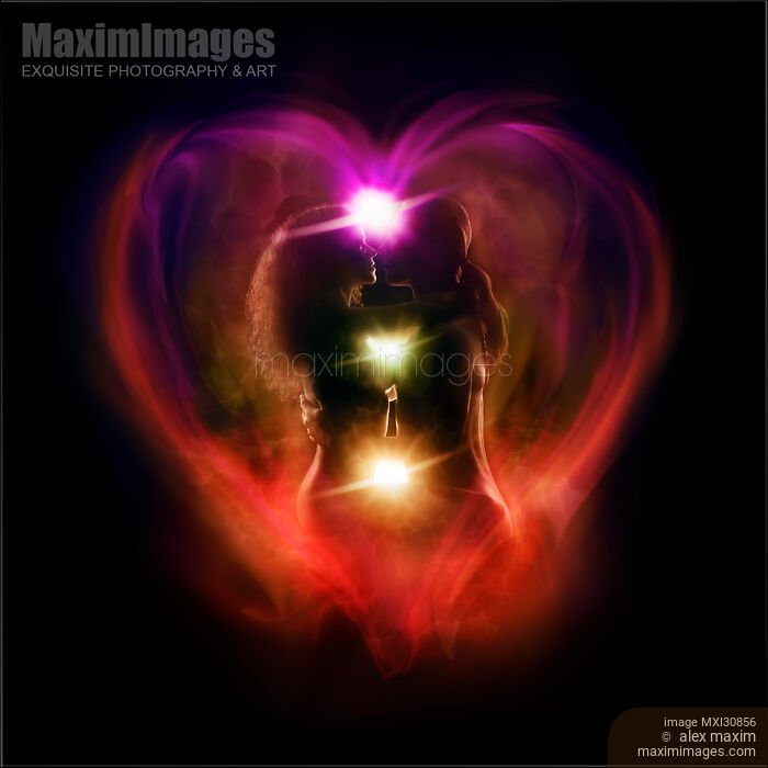 Tantra and Tantric sexuality spiritual concept of a couple making love with chakra energy flow in a shape of a heart around their bodies Stock Image MXI30856 © Alex Maxim / MaximImages