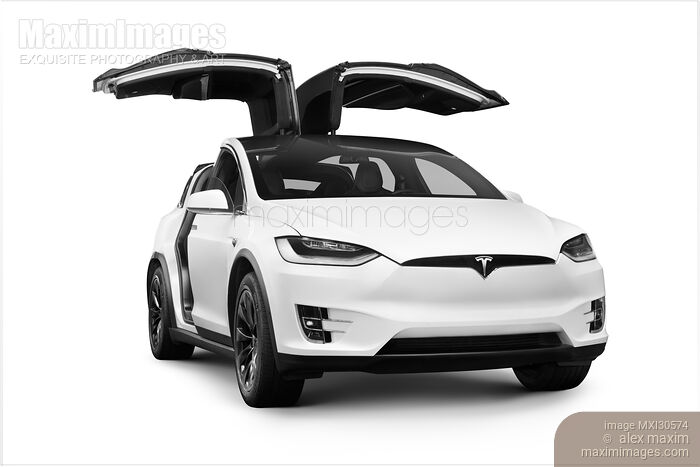 White Tesla X luxury SUV electric car with open falcon-wing doors Stock Image MXI30574 © Alex Maxim / MaximImages