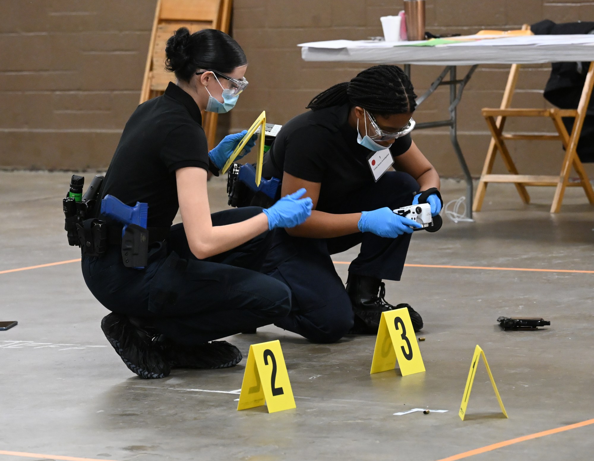 Students compete in the Crime Scene Investigation category in SkillsUSA's 2025 District 11 Championship Event on Wednesday, Jan. 22, 2025, at the Agri-Plex at the Allentown Fairgrounds. The contest tests the students abilities in various technical disciplines such as automotive service technology, aviation maintenance and health care skills. (Amy Shortell/The Morning Call)