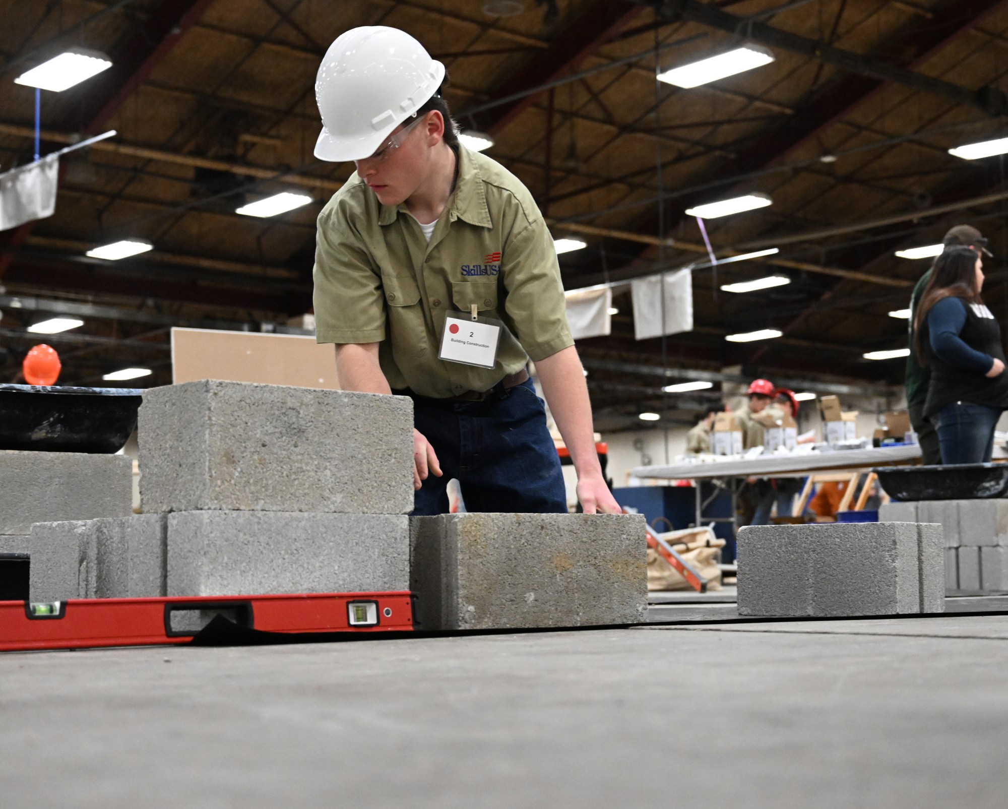 Students compete in the Building Construction category in SkillsUSA's 2025 District 11 Championship Event on Wednesday, Jan. 22, 2025, at the Agri-Plex at the Allentown Fairgrounds. The contest tests the students abilities in various technical disciplines such as automotive service technology, aviation maintenance and health care skills. (Amy Shortell/The Morning Call)