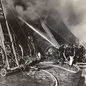 Firefighters in breathing apparatus, Oxford Street, London