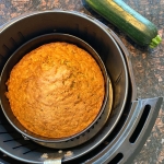 A freshly baked air fryer zucchini bread in the air fryer.