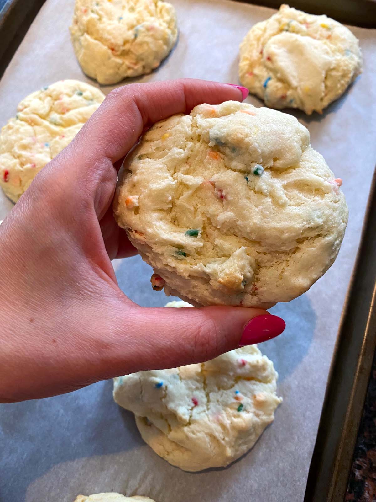 Funfetti cake mix cookies on a sheet pan.