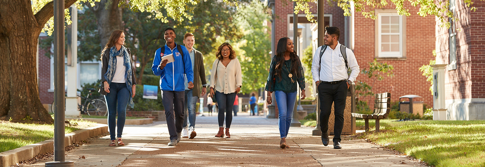 students traversing campus