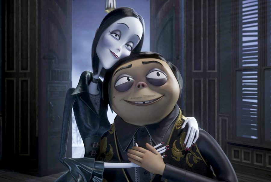 Charlize Theron and Oscar Isaac voice Morticia (left) and Gomez (right) in the newest adaptation of "The Addams Family."