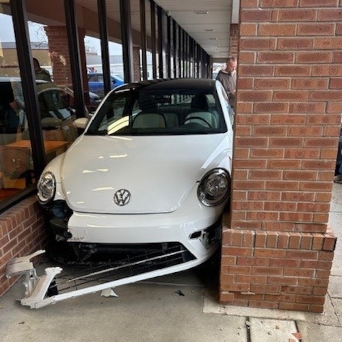 A car crashed into a pillar near the windows of Arbor Farms Market on Stadium Bvld in Ann Arbor