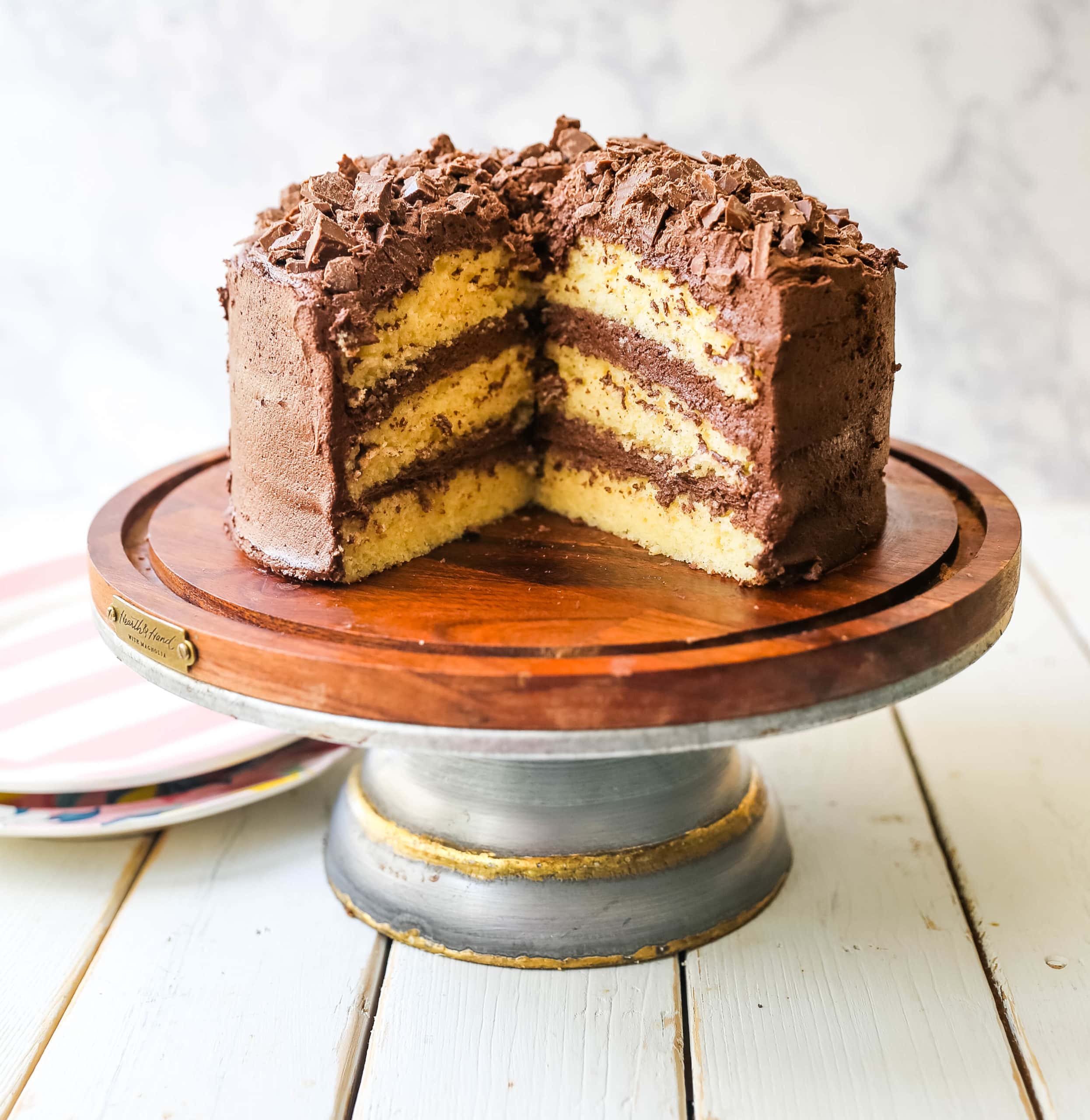 Yellow Cake with Chocolate Frosting The BEST Yellow Cake Recipe with Milk Chocolate Frosting. 5-Star Rated Recipe! www.modernhoney.com #yellowcake #homemadecake #cake #yellowcakechocolatefrosting #baking