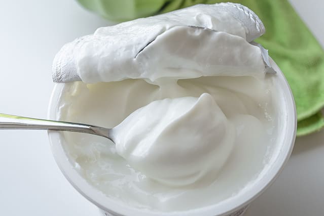 Healthy breakfast with Fresh greek yogurt on background