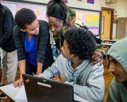 NMUTR teacher helping students