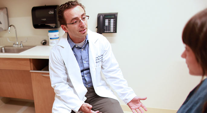 Doctor talking to a patient