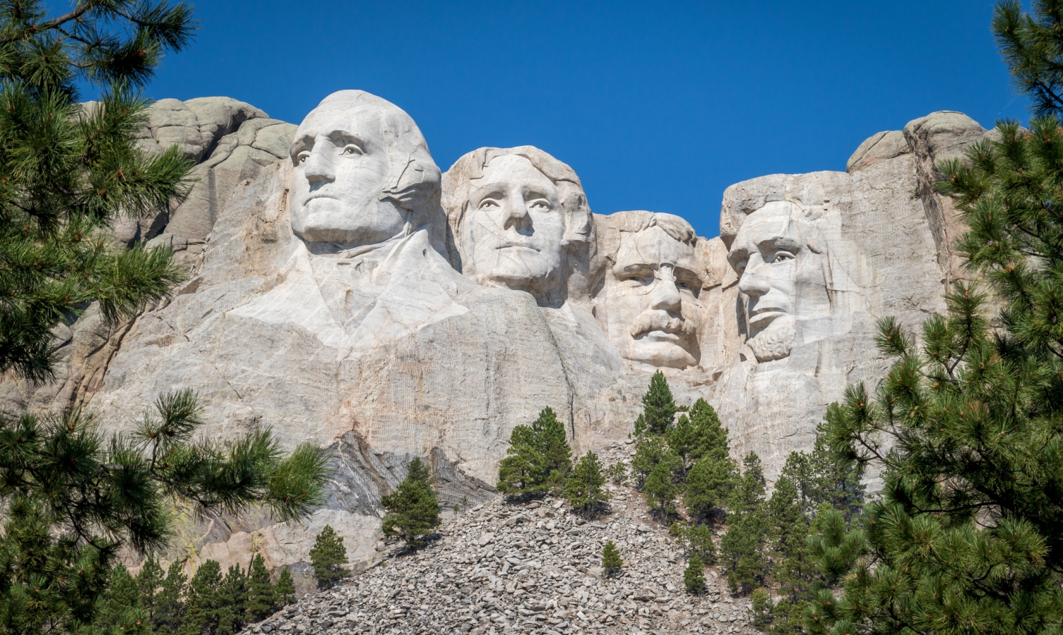 The busts of Presidents George Washington, Thomas Jefferson, Teddy Theodore Roosevelt, and Abraham Lincoln carved Borglum into the Black Hills of South Dakota at Mount Rushmore