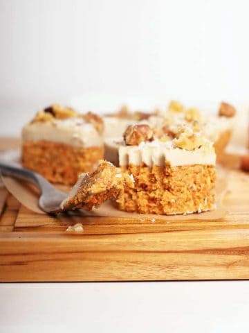 Raw carrot cake bites on a cutting board