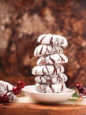 Stack of vegan chocolate crinkle cookies