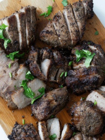 jerk pork on wood background