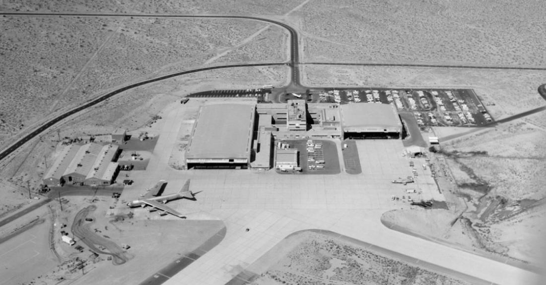 Aerial view of the Flight Research Center, now NASA’s Armstrong Flight Research Center, at Edwards Air Force Base, California, with one of the B-52 carrier aircraft at left and an X-15 at right.