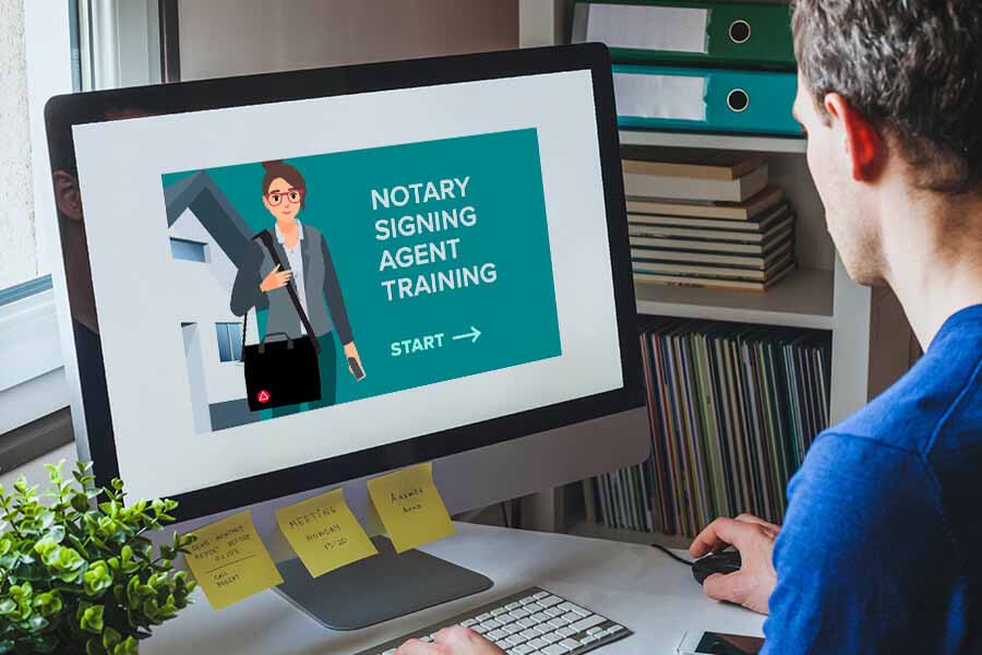 Computer screen showing Notary Signing Agent Training with a cartoon character, viewed by a person from behind.