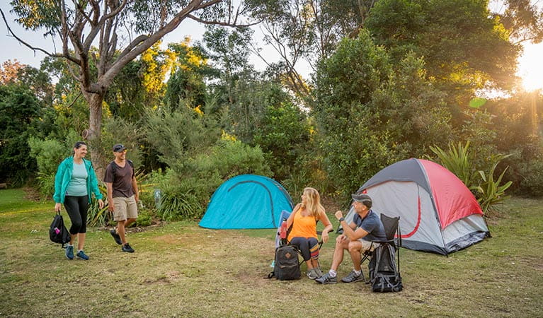 Group of friends camping at Putty Beach campground. Photo: John Spencer/DPIE