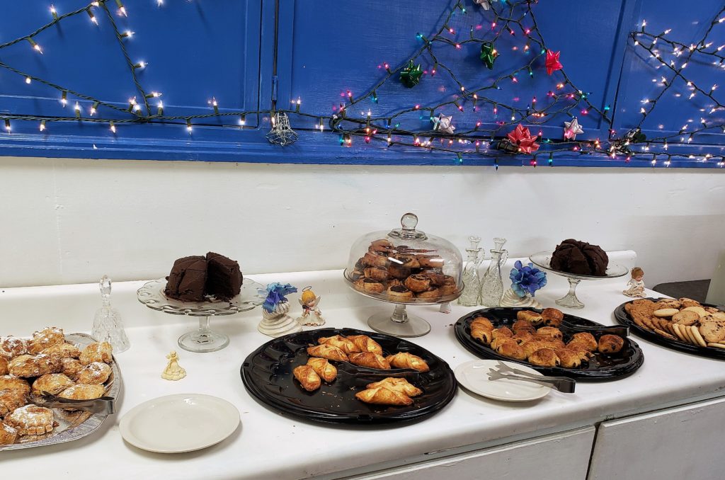 A table filled with platters of desserts. OH, YUM!